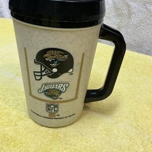 Vintage Aladdin NFL Jacksonville Jaguars Speckled Mug from 7-11 Black and Cream